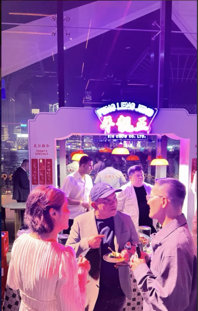 Outdoor Peng Leng Jeng event with neon signage at night
