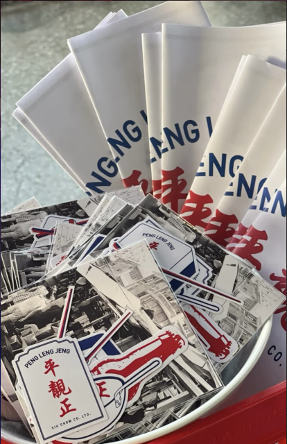 Stack of Peng Leng Jeng branded napkins and stickers
